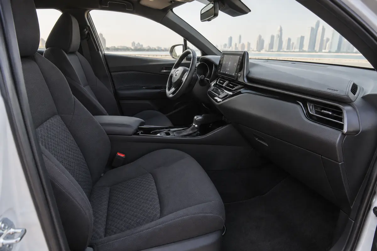 Toyota C-HR Hybrid 2022 interior and passenger seating for rental in Jordan