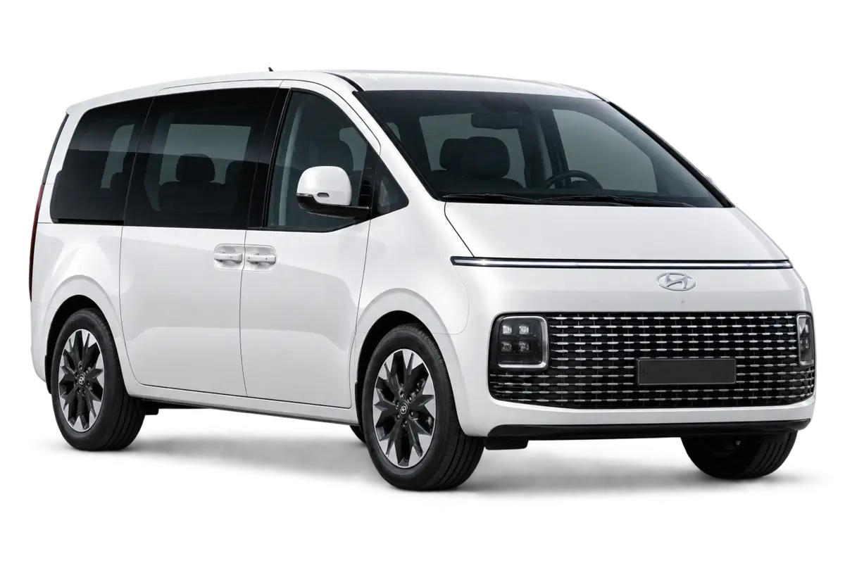 White Hyundai Staria nine-passenger minivan rental in Jordan
